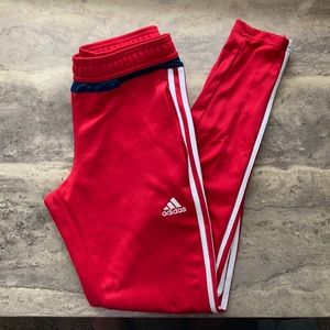 Red adidas track pants